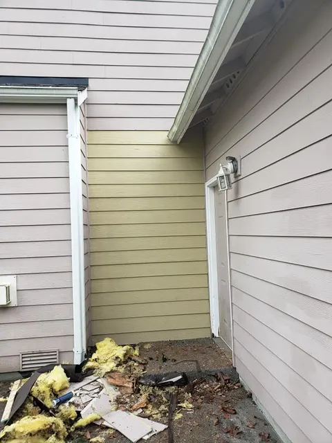Home exterior showing roofline, soffit, fascia, and gutter system in Tacoma, WA